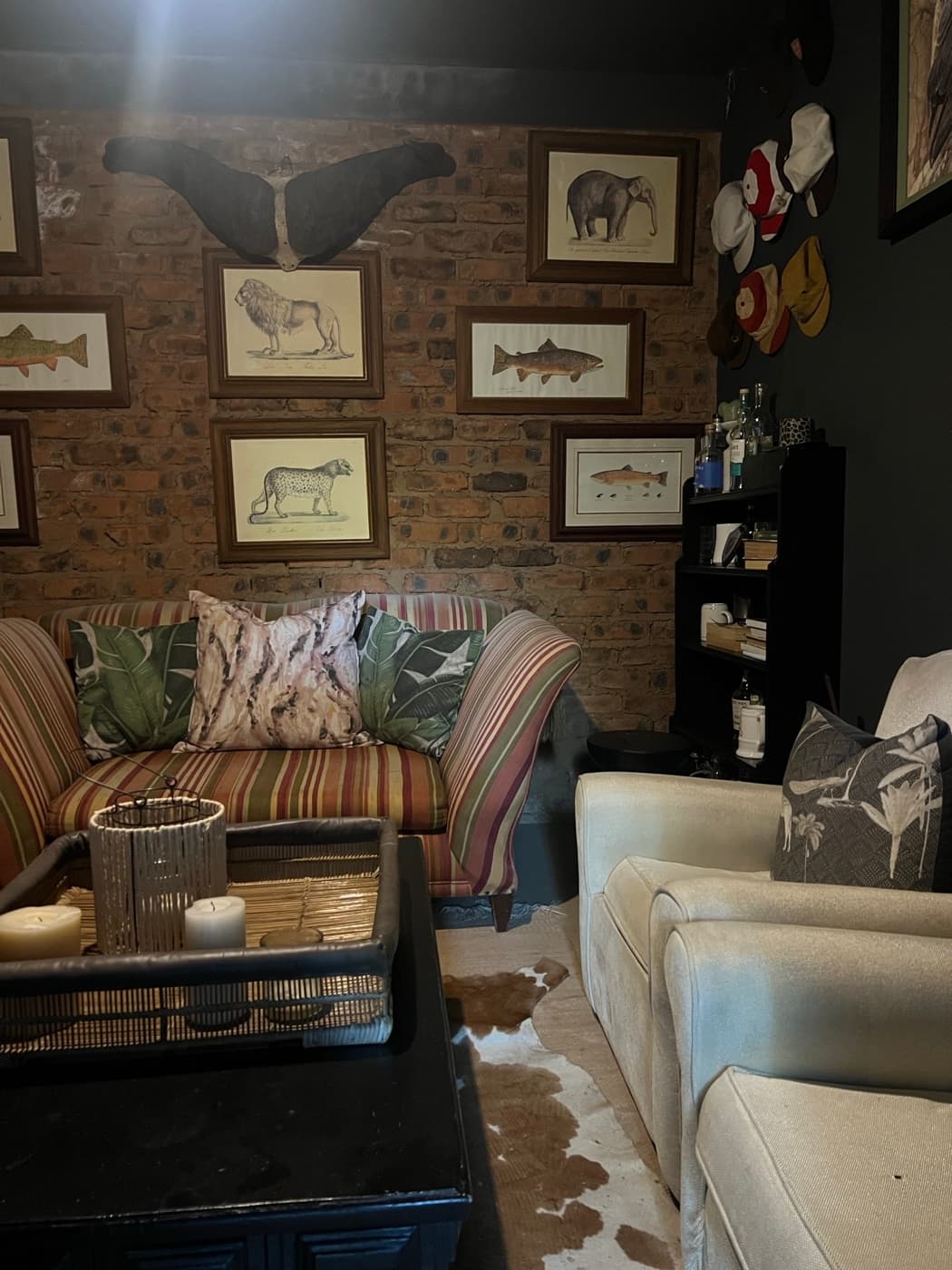 The WhiskyChilled HQ - mancave with brick walls and framed prints