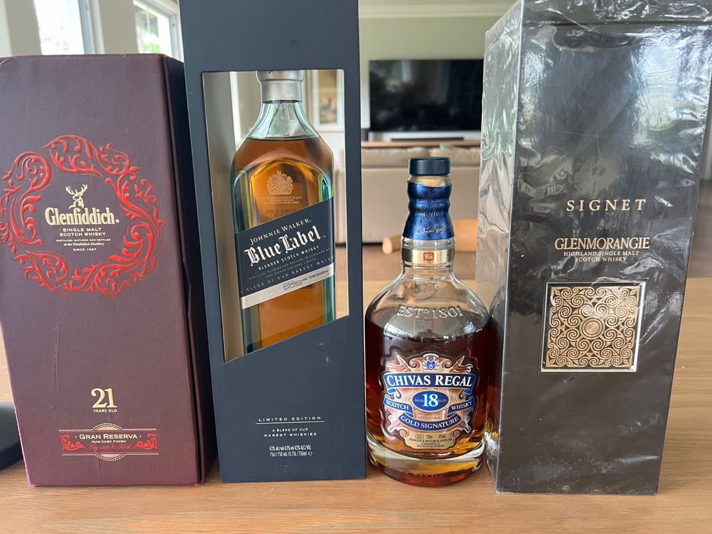 Premium whisky collection - Glenfiddich 21, Blue Label, Chivas 18, Glenmorangie Signet